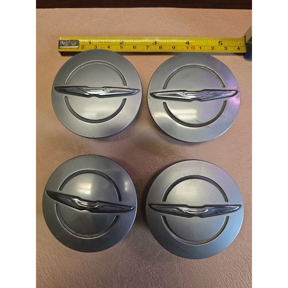 Chrysler Wheel Center Caps Set Of 4 Part# 1LB74TRMAB